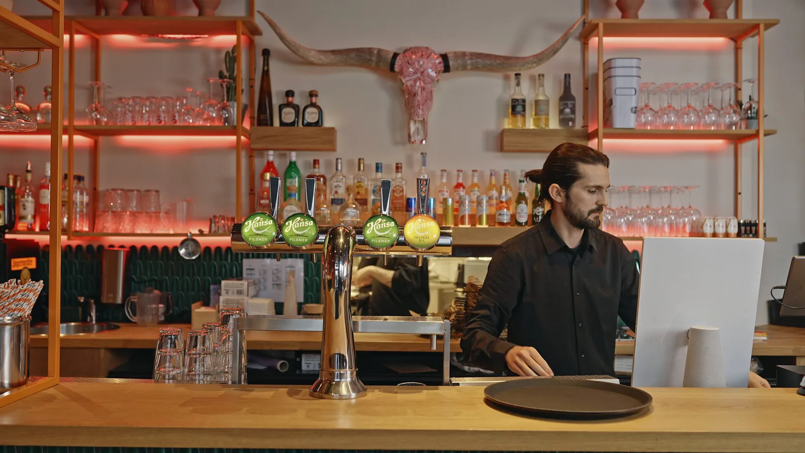 Restaurant staff working at the service counter